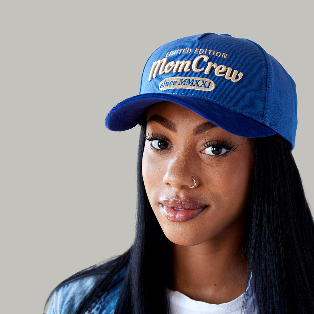 The MomCrew Limited Edition Cap features a cotton body with a corduroy brim, the signature embroidered logo, and an adjustable snap closure for a custom fit. It's stylish, comfortable, and designed for both moms and dads. Perfect for daily wear with a touch of exclusivity.
