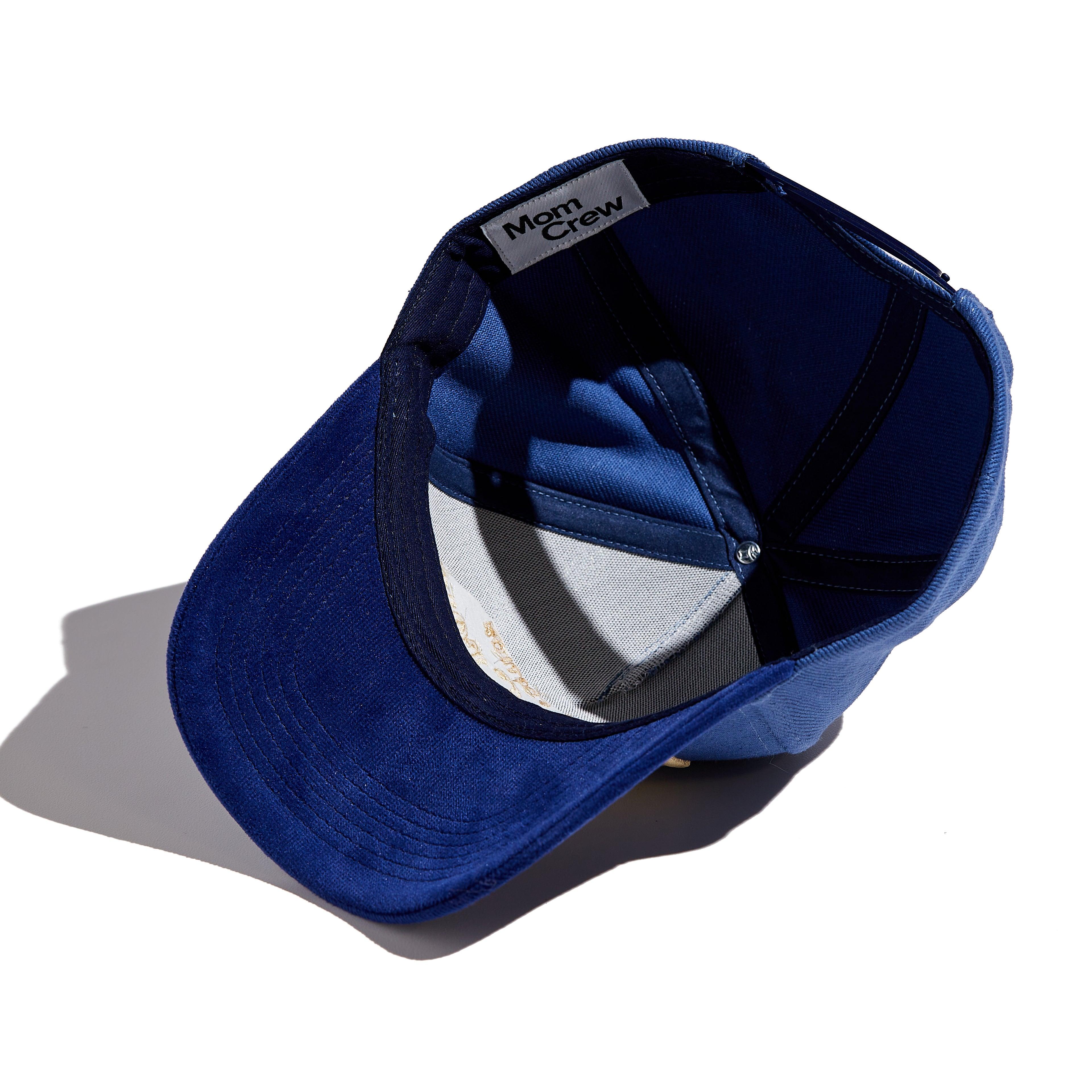 The MomCrew Limited Edition Cap features a cotton body with a corduroy brim, the signature embroidered logo, and an adjustable snap closure for a custom fit. It's stylish, comfortable, and designed for both moms and dads. Perfect for daily wear with a touch of exclusivity.