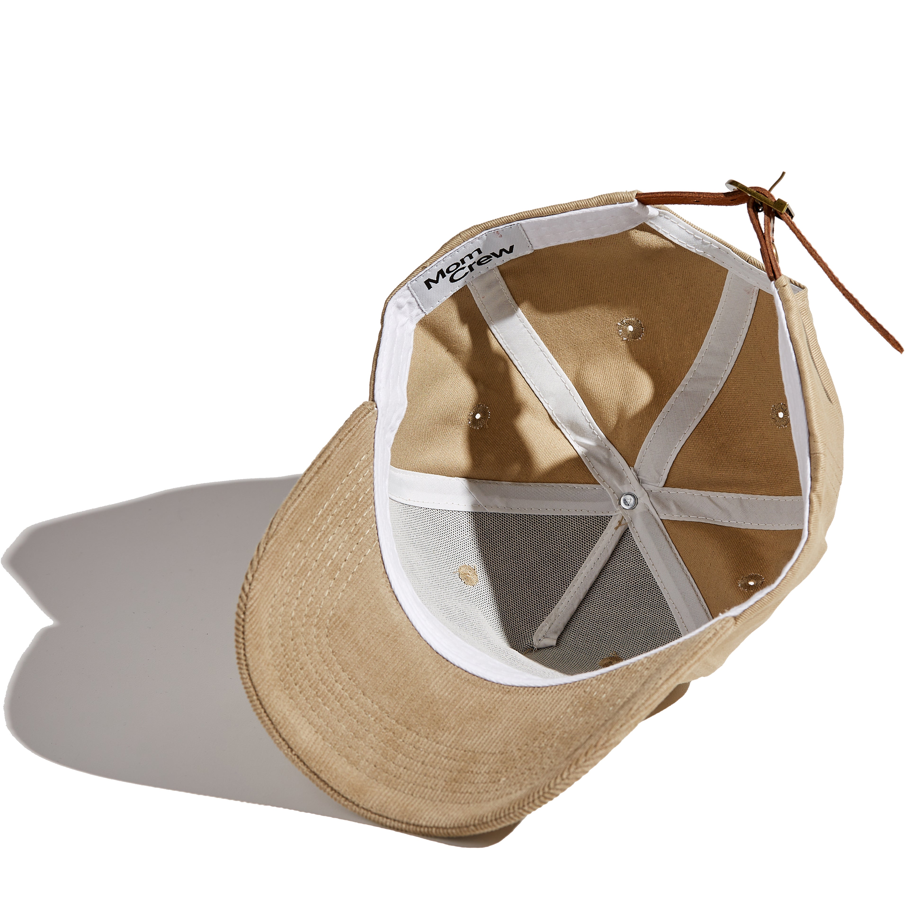 The MomCrew Natural Cap is designed for effortless style with a subtle, neutral tone. Made from 100% cotton, this cap features an adjustable snap strap to fit a variety of head sizes, making it perfect for both moms and dads. The soft natural hue and sleek design make it an easy match for any outfit, ideal for casual outings or daily wear.