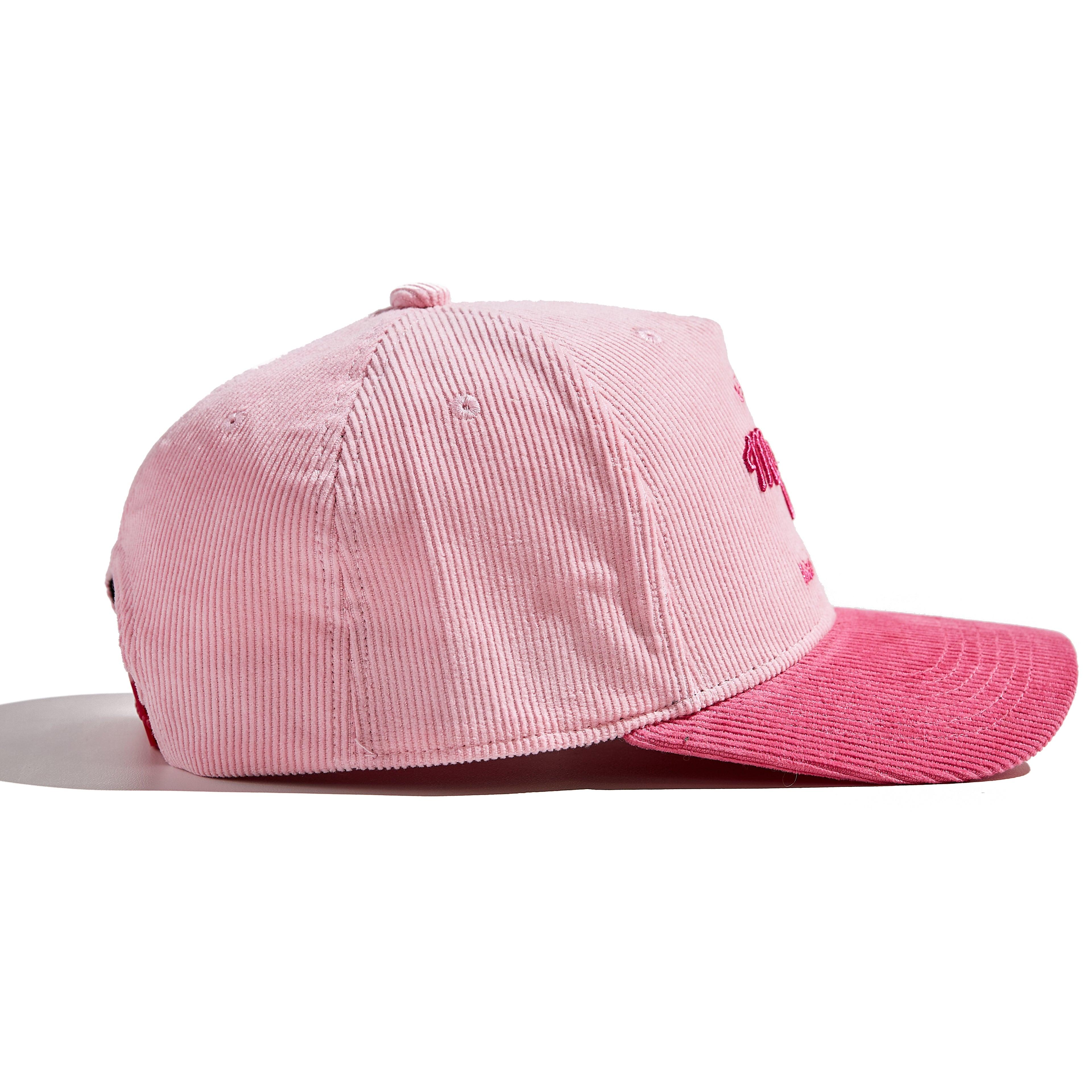 The MomCrew Pink Corduroy Cap is a stylish and versatile cap inspired by Barbie, designed with 100% cotton corduroy material for both the body and brim. It features the signature MomCrew logo embroidered in green and includes an adjustable snap closure to ensure a perfect fit for various head sizes, making it suitable for both moms and dads. This cap offers a chic, laid-back vibe, perfect for daily wear.