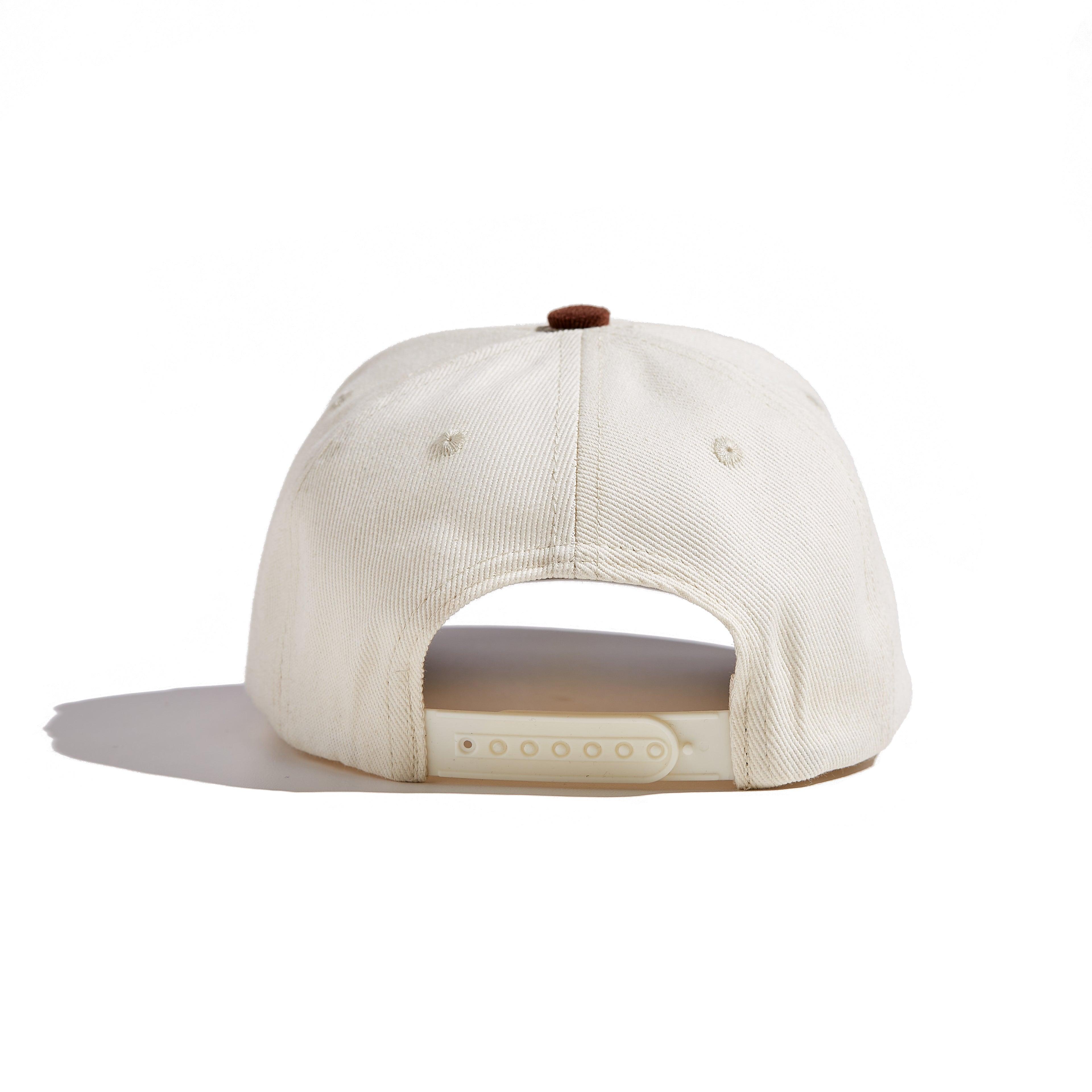The MomCrew Rancher Cap is a stylish cap crafted from a blend of 100% cotton and corduroy, featuring the iconic MomCrew embroidered logo. It's designed with an adjustable snap closure, making it a comfortable and customizable fit for both moms and dads. Ideal for those who appreciate a western-inspired look with a modern twist, this cap blends durability with style, making it perfect for everyday wear.
