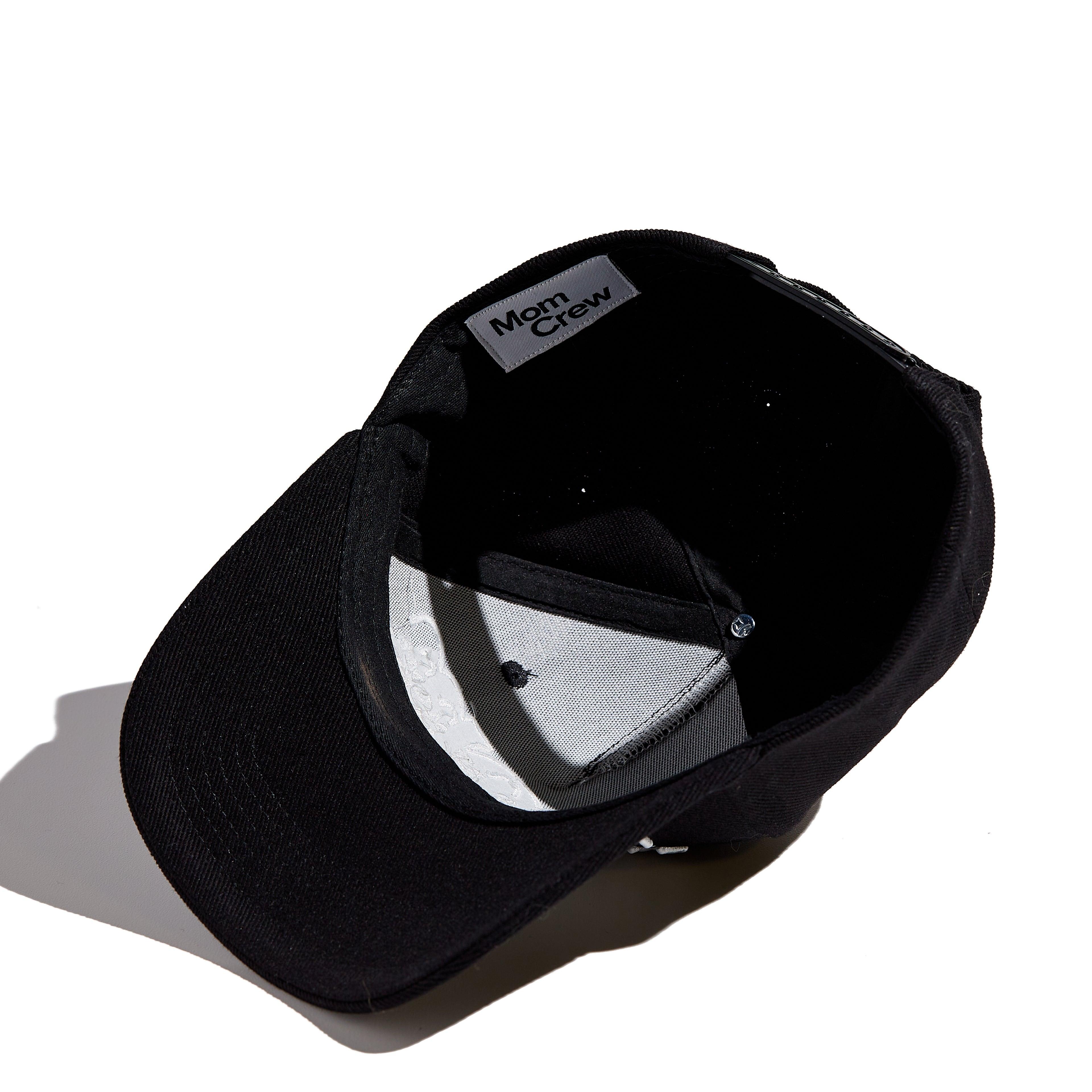 The MomCrew Statement Cotton Cap is a sleek and versatile accessory made from 100% cotton. It features the signature MomCrew logo embroidered on the front and comes with an adjustable snap closure to ensure a perfect fit for both moms and dads. This cap combines comfort and style, making it ideal for daily wear and supporting the MomCrew community in every outfit. Designed to fit most head sizes, it’s perfect for those who want to make a stylish statement while celebrating motherhood.