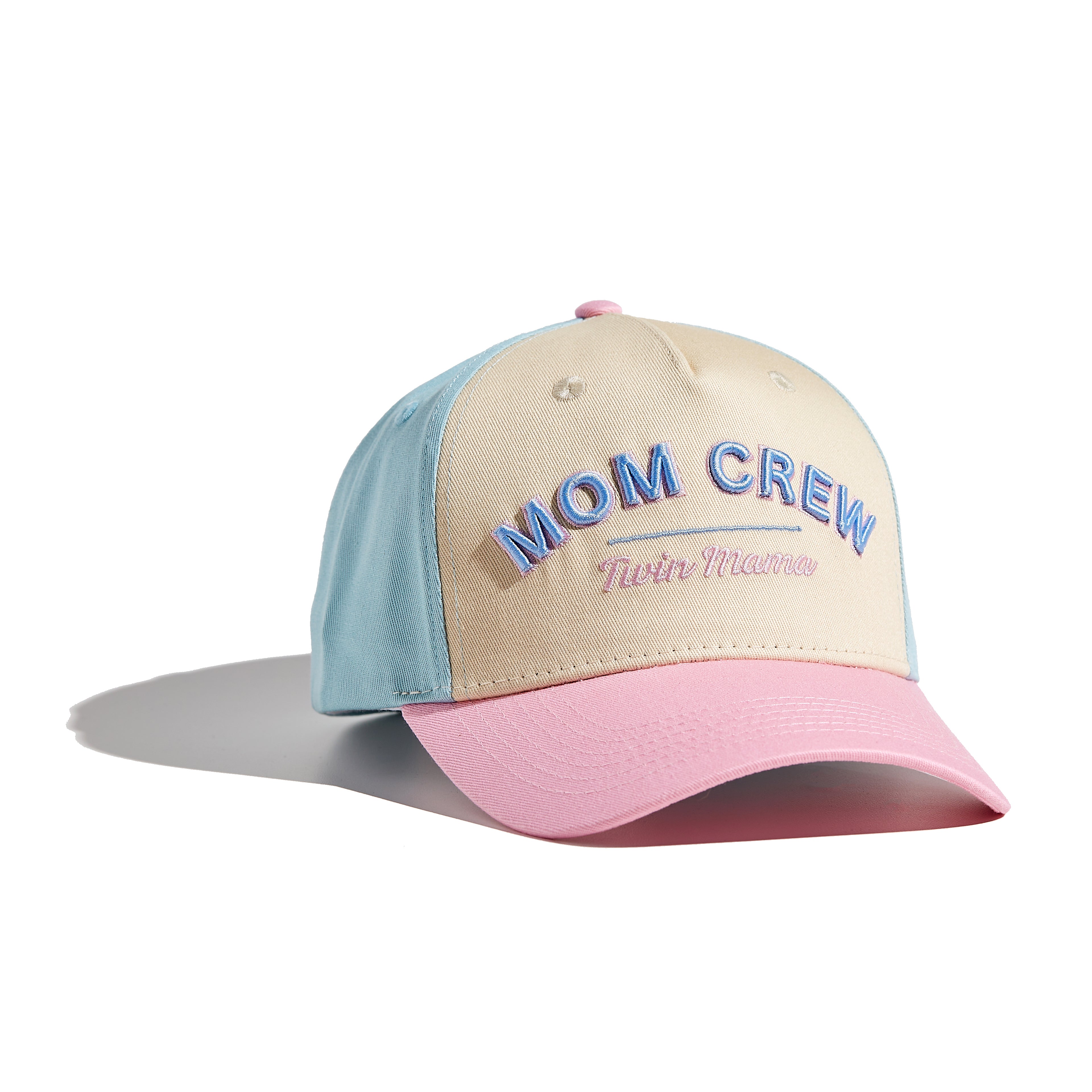 The MomCrew TWIN MAMA Cap is designed for proud moms of twins, featuring bold "TWIN MAMA" embroidery. This 100% cotton cap combines style and comfort, with an adjustable snap closure for a customized fit. It's perfect for busy days with your dynamic duo, offering a sleek and practical design suitable for both moms and dads.
