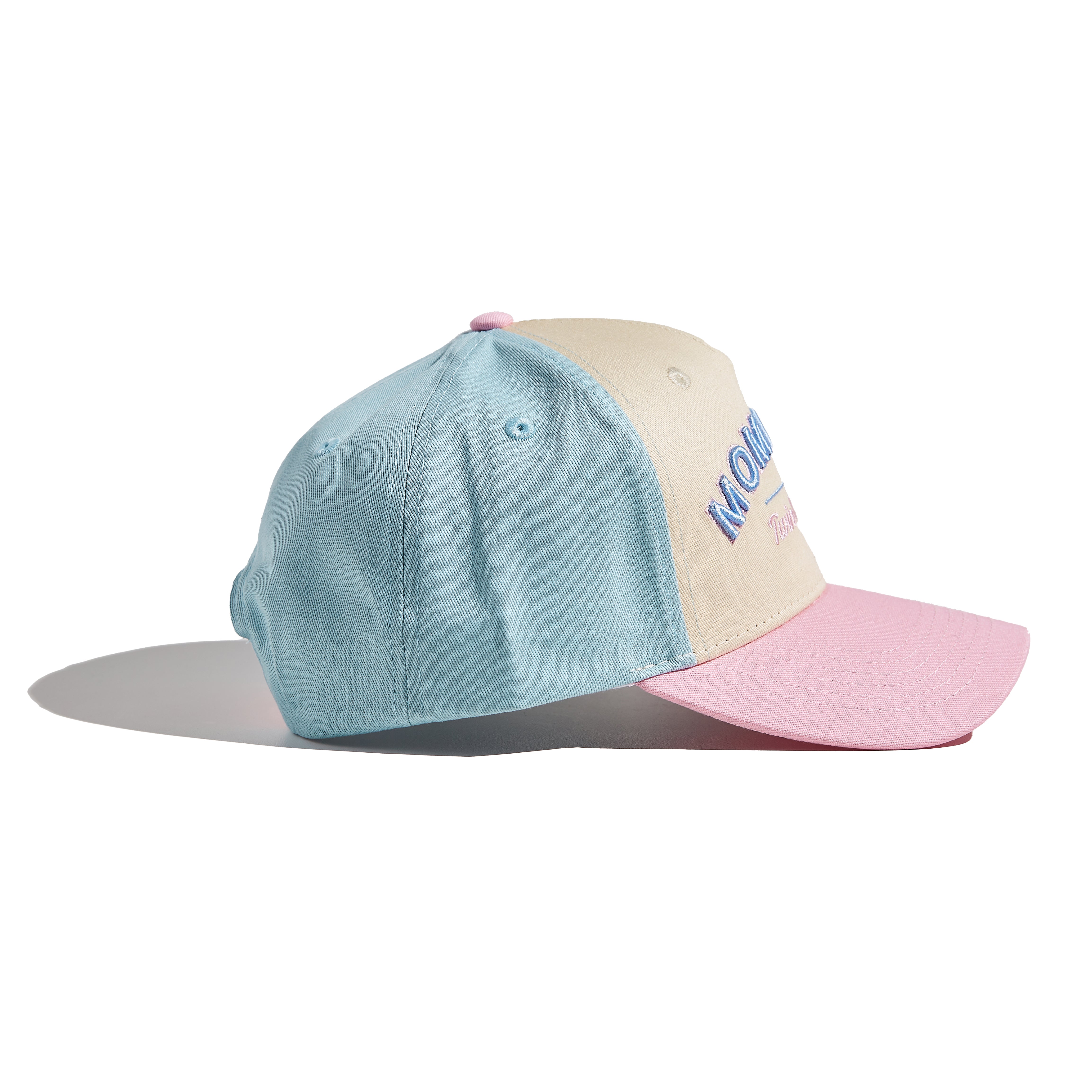 The MomCrew TWIN MAMA Cap is designed for proud moms of twins, featuring bold "TWIN MAMA" embroidery. This 100% cotton cap combines style and comfort, with an adjustable snap closure for a customized fit. It's perfect for busy days with your dynamic duo, offering a sleek and practical design suitable for both moms and dads.