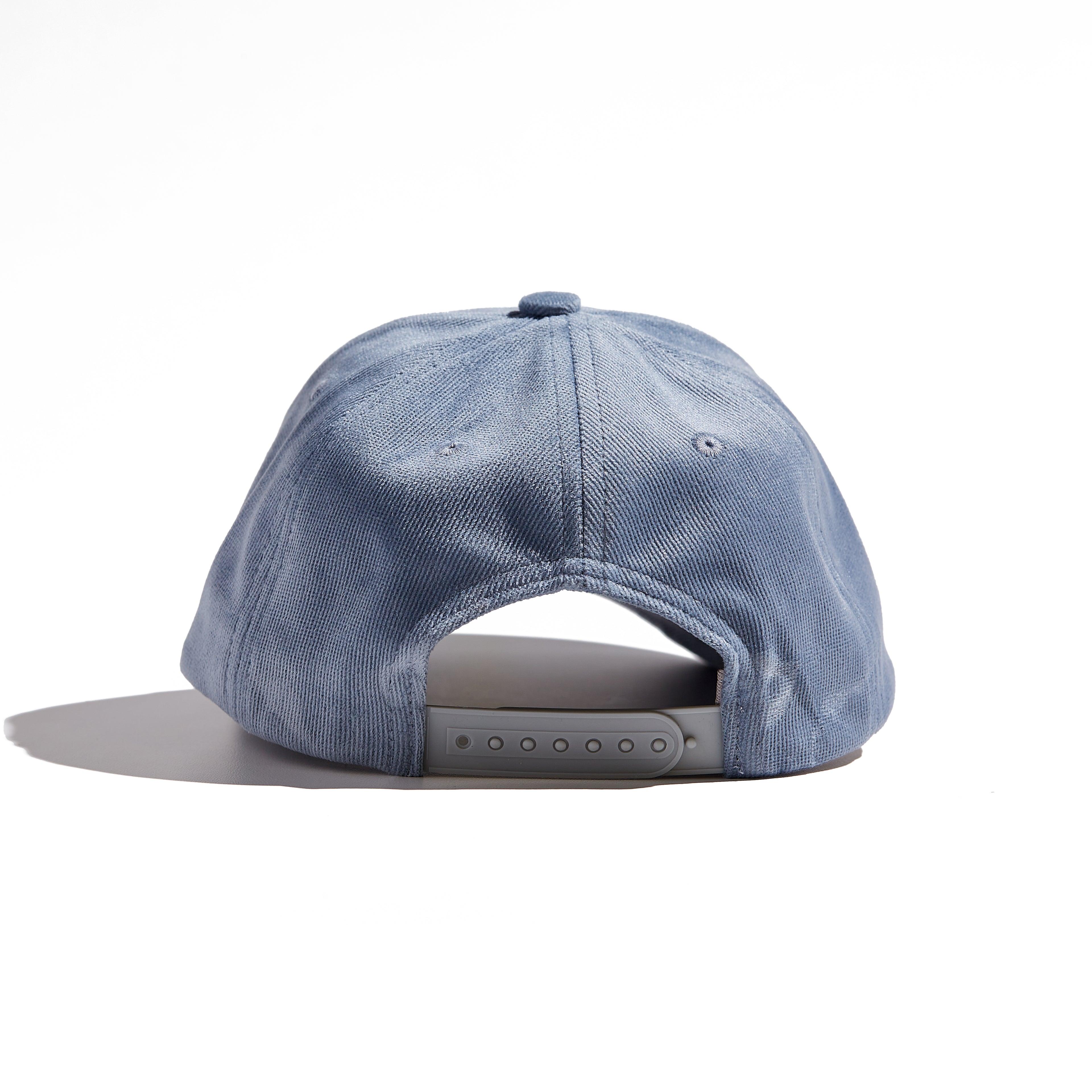 The MomCrew Classic Corduroy Cap is crafted from 100% cotton corduroy, offering a soft and comfortable fit. Featuring the signature MomCrew embroidered logo, it has an adjustable snap closure to accommodate various head sizes, making it suitable for both moms and dads. This stylish cap combines comfort and durability, perfect for everyday wear.