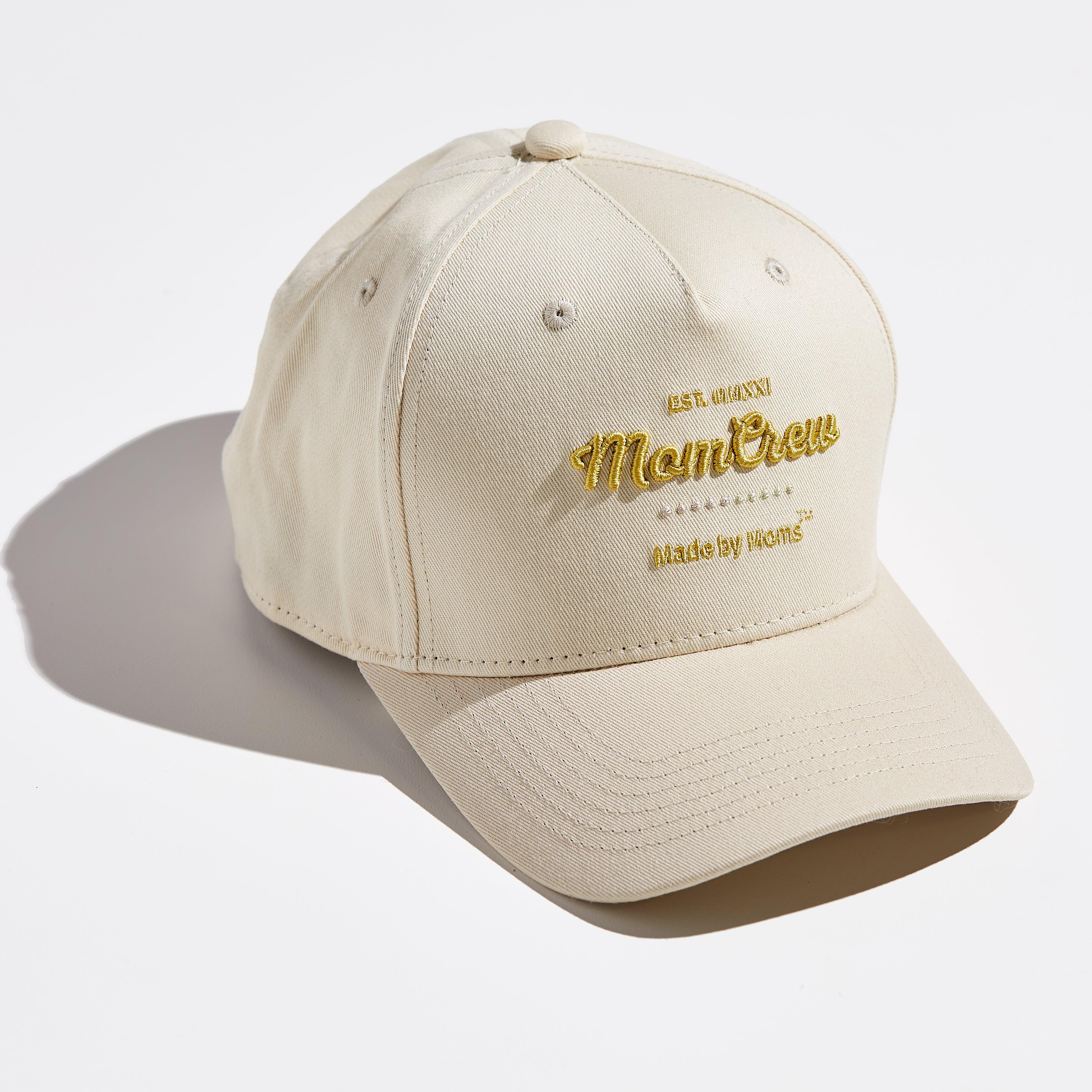 The MomCrew Classic Cotton Cap is a versatile everyday hat made from 100% cotton, featuring the signature MomCrew embroidered logo. It includes an adjustable snap closure for a customizable fit, designed for both moms and dads. The cap is comfortable, stylish, and perfect for daily wear, allowing you to represent the MomCrew community effortlessly.