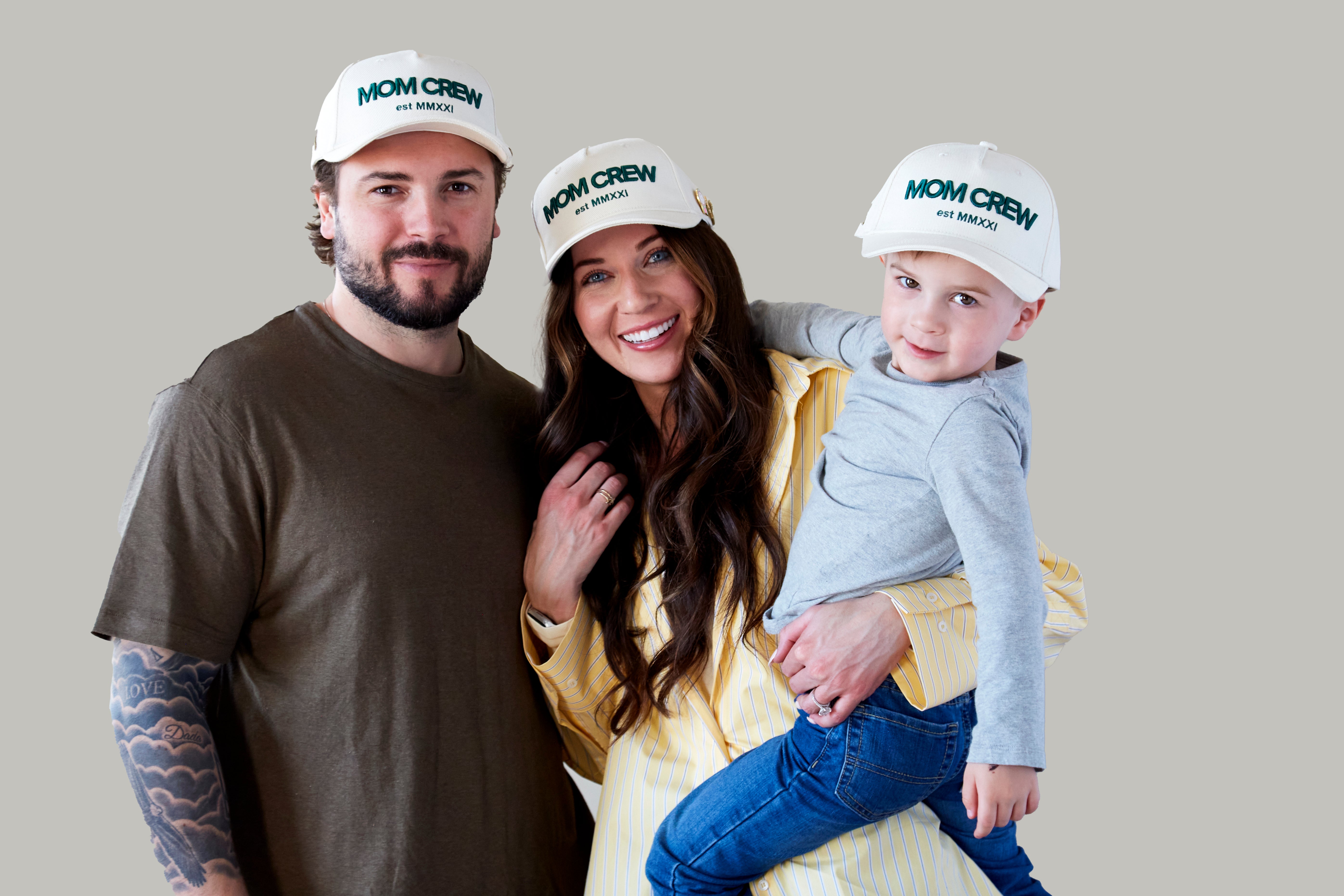 The MomCrew Essential Cotton Cap is a versatile and stylish accessory made from 100% cotton. It features the signature green MomCrew embroidered logo on the front and an adjustable snap closure for a custom fit, making it suitable for both moms and dads. This cap is perfect for everyday wear, combining comfort and durability, and is designed to fit most head sizes.