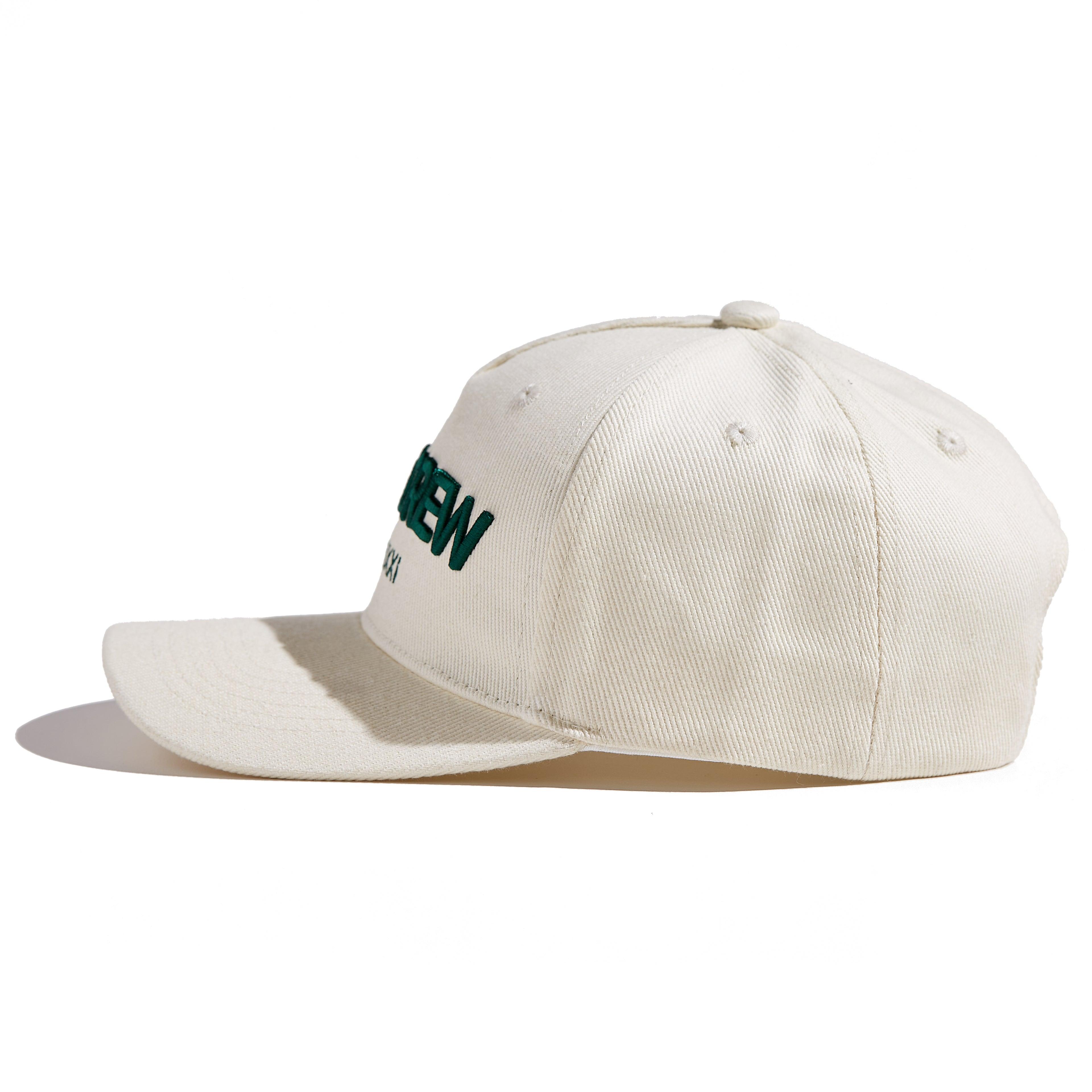 The MomCrew Essential Cotton Cap is a versatile and stylish accessory made from 100% cotton. It features the signature green MomCrew embroidered logo on the front and an adjustable snap closure for a custom fit, making it suitable for both moms and dads. This cap is perfect for everyday wear, combining comfort and durability, and is designed to fit most head sizes.