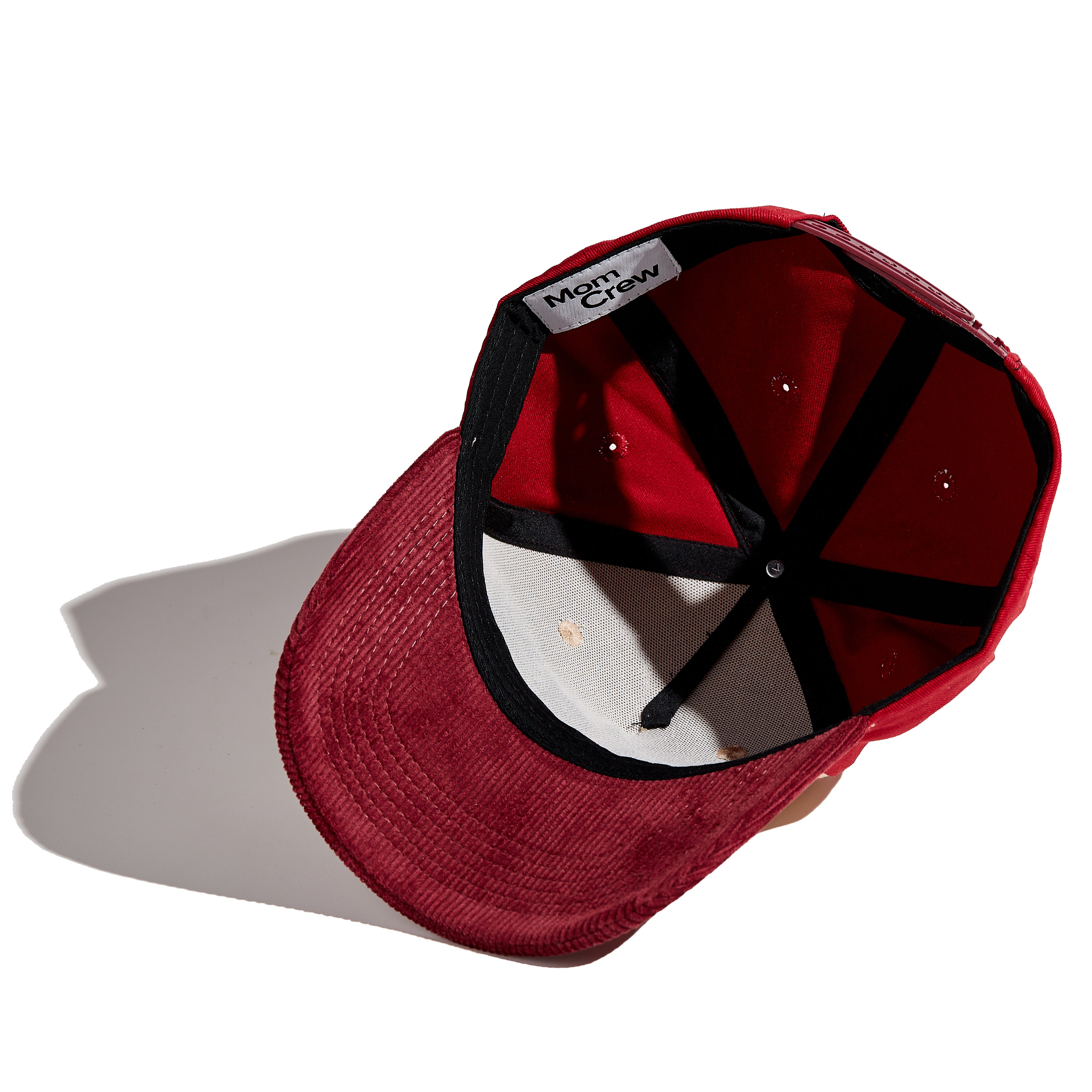 The MomCrew "In God We Trust" Cap is a versatile, stylish cap that combines faith and motherhood. It features the bold "In God We Trust" embroidery on the front with the MomCrew logo, making it perfect for moms who want to showcase their faith. Made from 100% cotton, this one-size cap includes an adjustable snap strap for a customizable fit, making it suitable for both moms and dads. Whether you're running errands or spending time with family, this cap allows you to express your faith and support motherhood