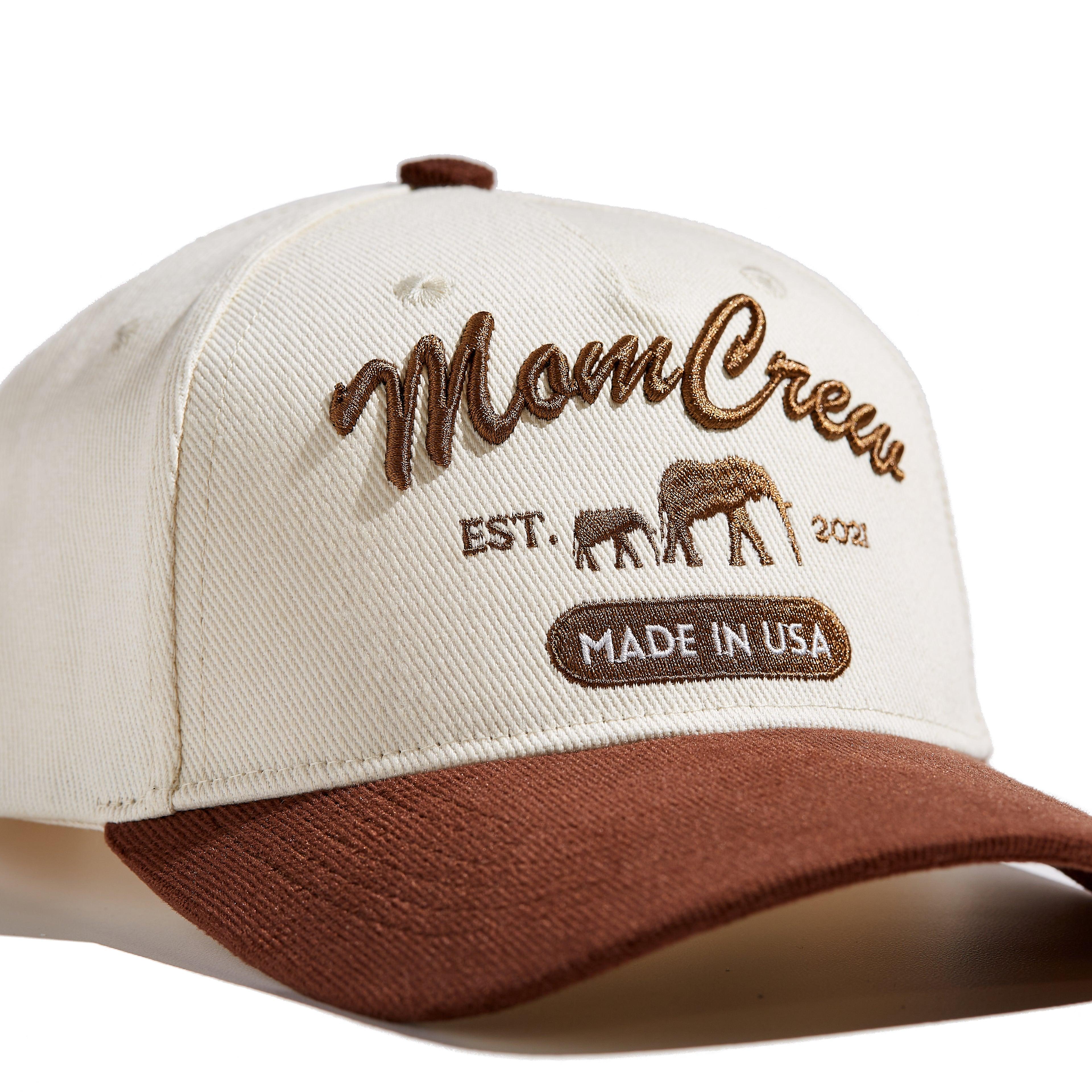 The MomCrew Rancher Cap is a stylish cap crafted from a blend of 100% cotton and corduroy, featuring the iconic MomCrew embroidered logo. It's designed with an adjustable snap closure, making it a comfortable and customizable fit for both moms and dads. Ideal for those who appreciate a western-inspired look with a modern twist, this cap blends durability with style, making it perfect for everyday wear.